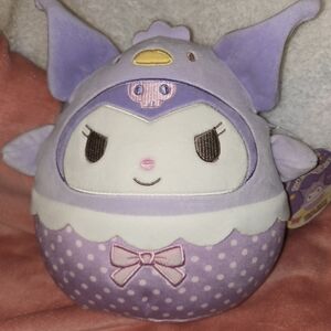 Purple and White Plush Toy